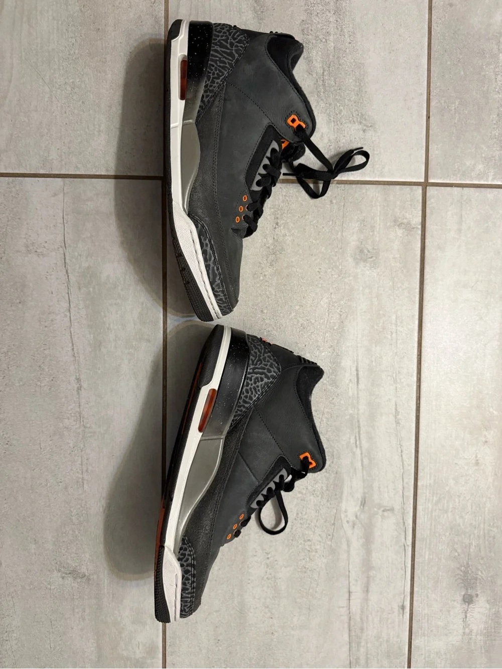 Jordan Men’s Black Sneakers with Orange Accents